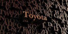 Toyota - Wooden 3D Rendered Letters/message.  Can Be Used For An Online Banner Ad Or A Print Postcard.