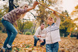© chika_milan - Dad, mom and son  flying a kite in nature