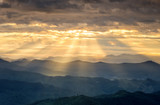 Fototapeta Na sufit - Ray of light landscape, View of mountains with ray of morning gold light.