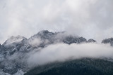 Fototapeta Na ścianę - Misty mountain scene in Dolomites mountain Italy