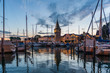 Waterfront and moored boats at sunset, Lindau
