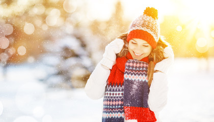 Wall Mural - happy young woman in winter for a walk