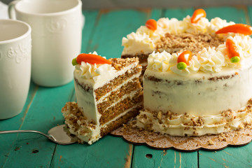 Wall Mural - Slice of carrot cake with cream cheese frosting