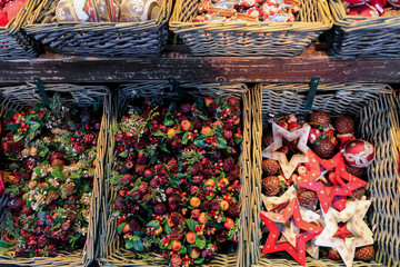 Colorful close up details of christmas fair market. Balls decora