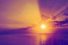 Beautiful Purple And Yellow Sunrise Over Sea