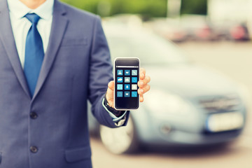 close up of business man with smartphone menu