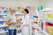 © Syda Productions - pharmacist and senior man buying drug at pharmacy