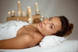 © Cookie Studio - Young beautiful girl relaxing in spa salon.