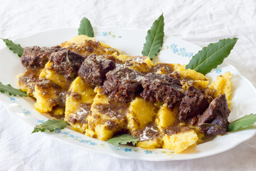 Polenta with wild boar stew