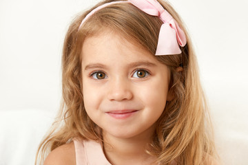 Adorable little child girl face closeup portrait