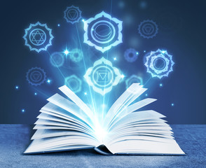Wall Mural - book with magic symbols