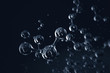 Water molecules on dark background - Creative abstract 3d illustration