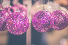 Close-up Of Pink Christmas Bauble Decorations