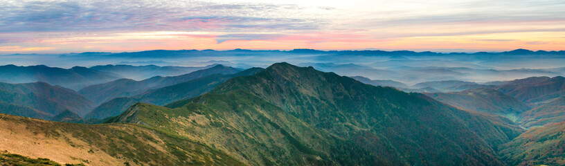 Wall Mural - Panorama of mountains at sunset