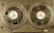 © Hayati Kayhan - Reel to reel player and recorder. Sepia image.