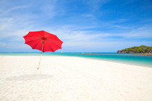 Red Beach Umbrella With Sky Background