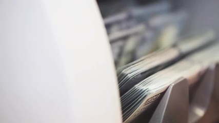 Wall Mural - hand taking money from counting machine