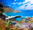 Cala y mar.Isla de Tenerife.Canarias.Paisaje marino y roca volcanica.Viajes y aventuras por la costa.Vegetación y acantilado bajo los rayos del sol