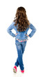 © svetamart - Portrait of adorable little girl in jeans standing back