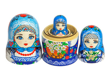 Three traditional Russian matryoshka dolls and blanks for painting dolls. Clean matryoshka.