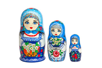 Three traditional Russian matryoshka dolls and blanks for painting dolls. Clean matryoshka.