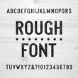 Rough alphabet font. Scratched type letters and numbers on a wooden background. Retro stock vector typography for your design.