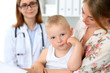 © rogerphoto - Little boy child  with his mother  after health exam at doctor's office