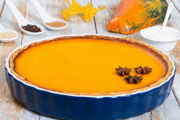 Canvas Print - delicious Fresh round bright orange homemade pumpkin pie