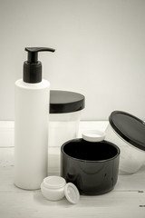 Wall Mural - Jars for cosmetics on a white background