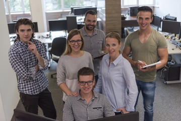 group of young startup business people standing as team