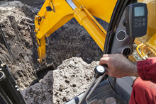 Excavator Digging Hole Ground