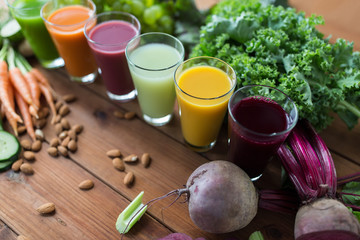 Wall Mural - glasses with different fruit or vegetable juices