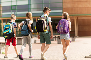 Sticker - group of happy elementary school students walking