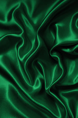 Wall Mural - Smooth elegant green silk or satin texture as background