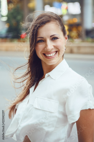 Closeup Portrait Of Young Smiling Caucasian Woman Girl With Blue