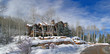 Large house in winter forest,  above Vail Valley,Colorado