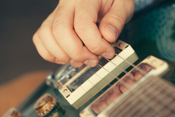 Wall Mural - man playing electric guitar