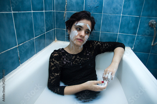 Girl With White Face Paint With Short Hair And Brown Eyes