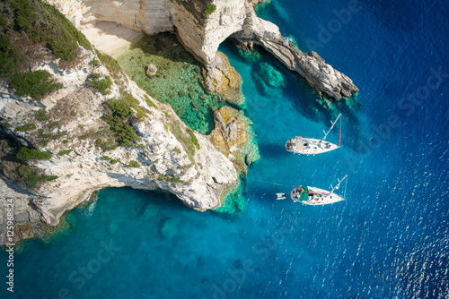 Fotografie, Obraz Sailboats in a beautiful bay, Paxos island, Greece