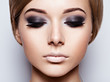 © Valua Vitaly - The girl's face closeup with long black lashes. fashion makeup