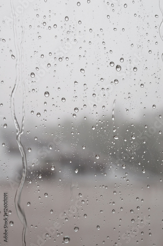 Naklejka - mata magnetyczna na lodówkę Drops of rain on the window