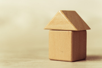 The green wooden house from children's blocks