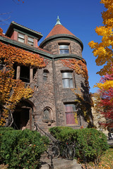 Canvas Print - college building with colorful ivy in fall