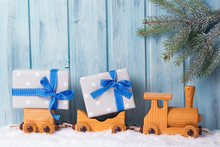 Old Wooden Toy Train With Christmas Gifts, Wooden Background