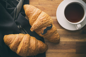 Father's day concept. Croissant with mustache.