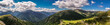 Gipfel in den Hochalpen von Österreich in Kärnten unter Schäfchenwolken als Panoramafoto