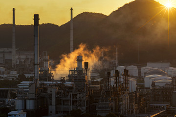 Wall Mural - Oil refinery industry at sunset - factory - petrochemical plant