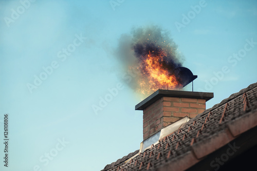 Fotomural Chimney with a fire coming out