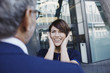 © Westend61 - Excited woman looking at businessman