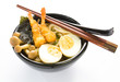 japanese white udon noodle in black bowl